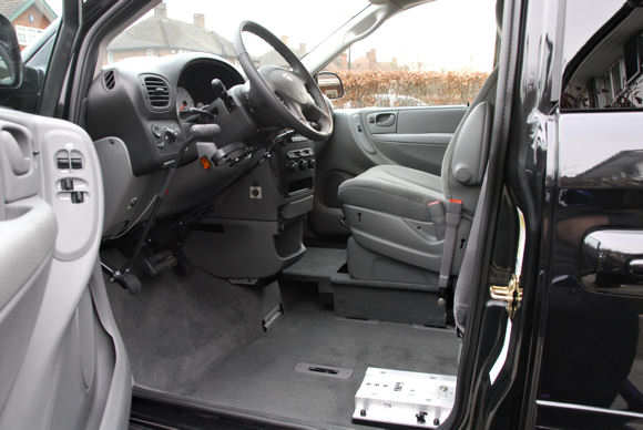 Veiw inside drivers area - see the level of the original floor by looing at the driver seat