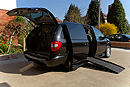 The Chrysler minivan with ramp deployed, tailgate open (which is remote electonically operated)