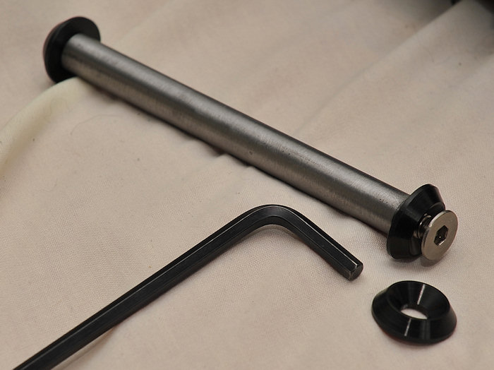 Front wheelchair axle