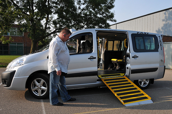 E7 Van with wheelchair ramp lowered